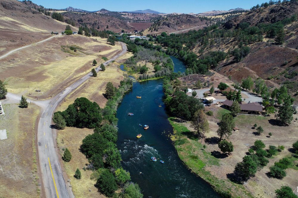 Klamath3 Rafters float the Klamath River, with Iron Gate Dam looming in the distance.