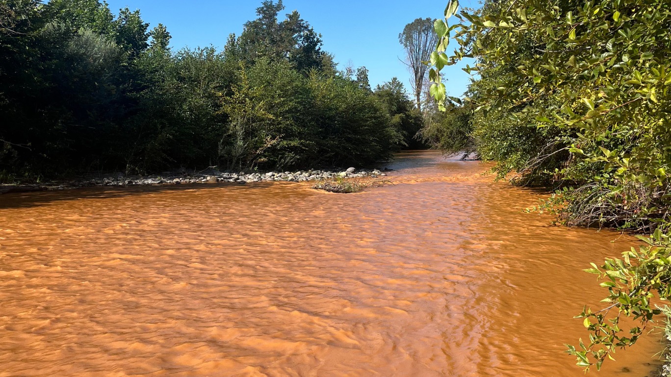 Orange water in a creek