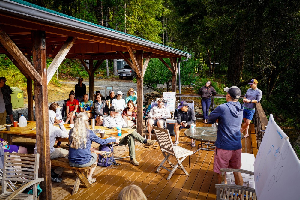 Staff gather at a lodge